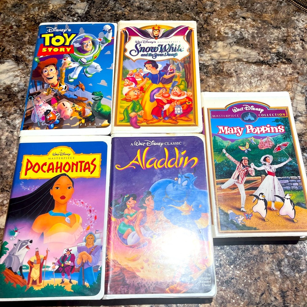 Original Walt Disney VHS tapes in plastic cases